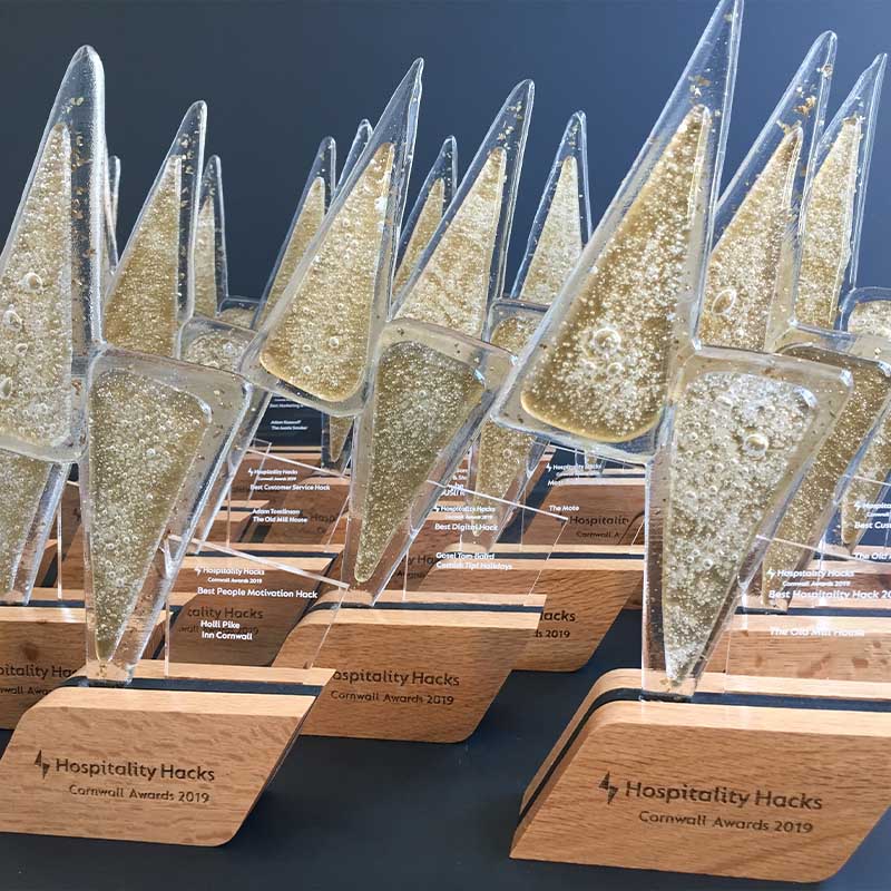 Bespoke Glass and Bamboo Hospitality Awards in shape of lightning bolt